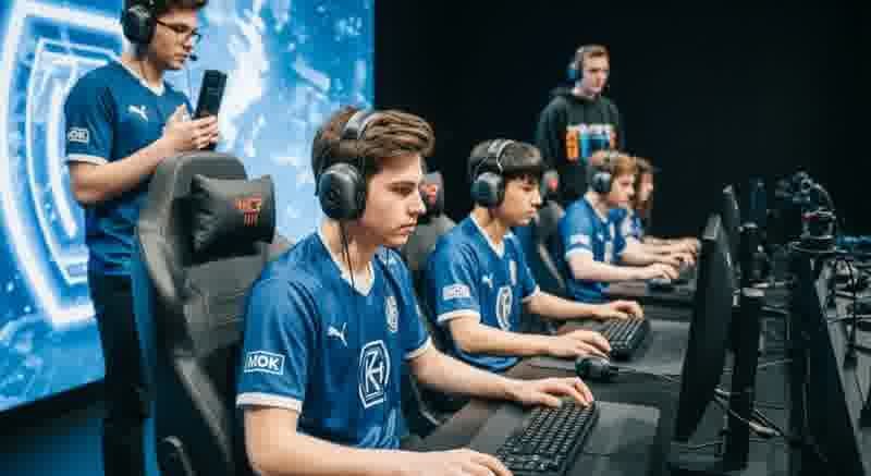 Pro players practicing together in a gaming room.